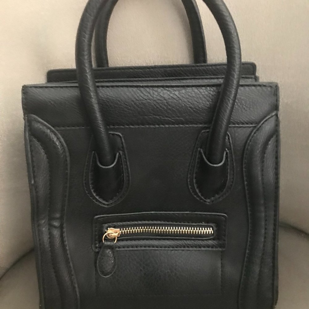 Black faux leather bag